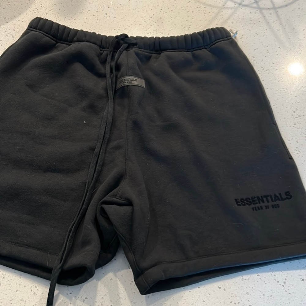 Men’s Fear of God ESSENTIALS black shorts size Large. NEW WITH TAGS!